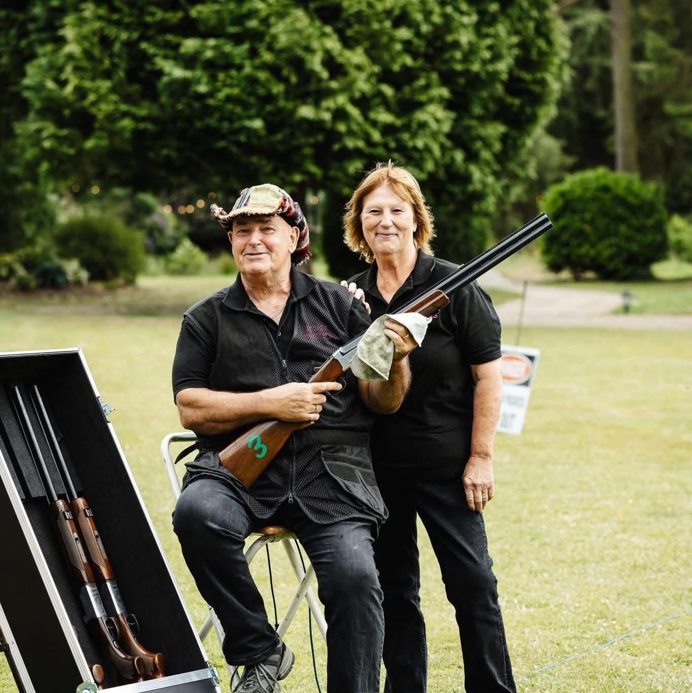The LMS team hosting a laser clay shooting session on a country estate lawn